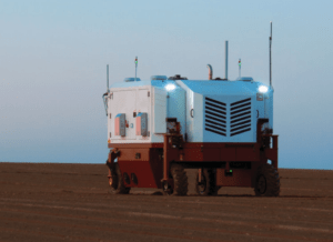 Carbon Robotics weeding robot at dusk