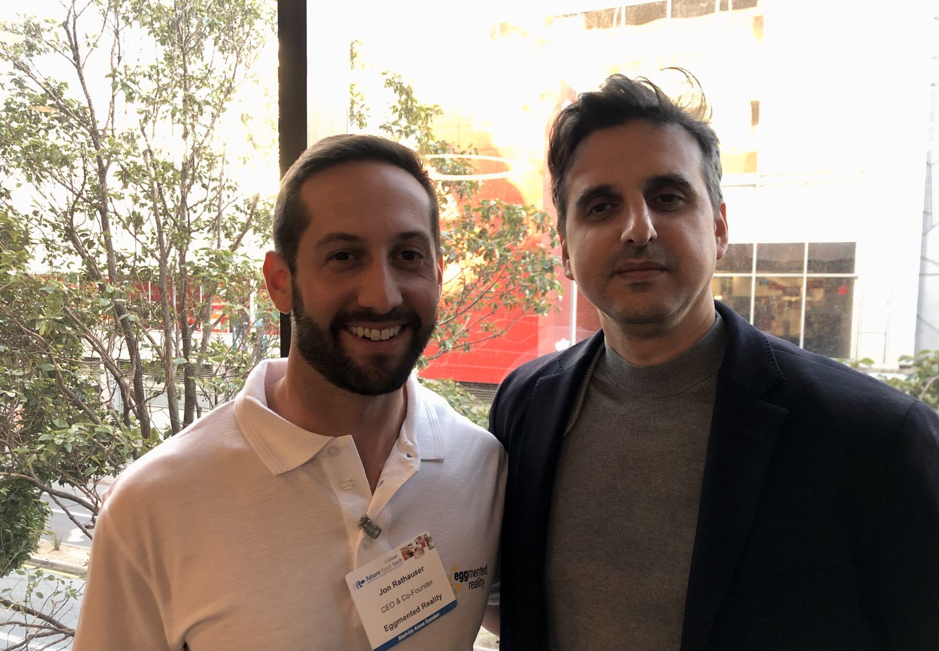 Eggmented Reality cofounder and CEO Jonathan Rathauser (L) with Tnuva chief innovation officer Shay Cohen 