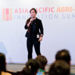 Insectta’s Chua Kai-Ning on stage at the 2022Agri-Food Innovation Summit