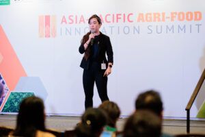 Insectta’s Chua Kai-Ning on stage at the 2022Agri-Food Innovation Summit
