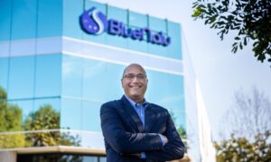 Lou Cooperhouse, BlueNalu co-founder, president & CEO, standing in front of BlueNalu headquarters and pilot food production facility in San Diego, California