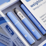 Two packages of 5 dosing pens each of a fictitious Semiglutin drug used for weight loss (antidiabetic medication or anti-obesity medication) on a blue transparent background. Fictitious package design