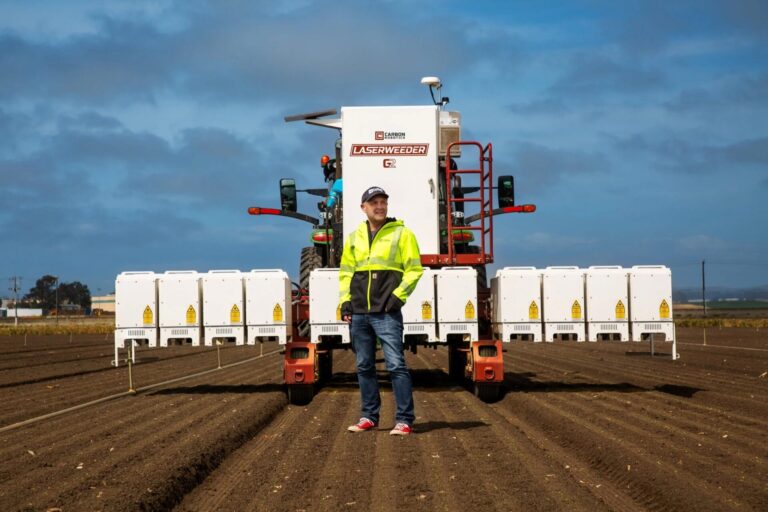 Paul Mikesell, founder and CEO of Carbon Robotics, with the G2 LaserWeeder. Image credit: Carbon Robotics
