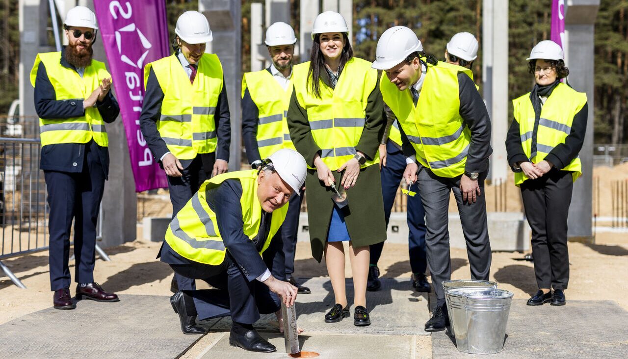 Dr. Danas Tvarijonavicius places a symbolic capsule into the foundations of the future factory at the Vilnius City Innovation Industrial Park. Image credit: Pentasweet